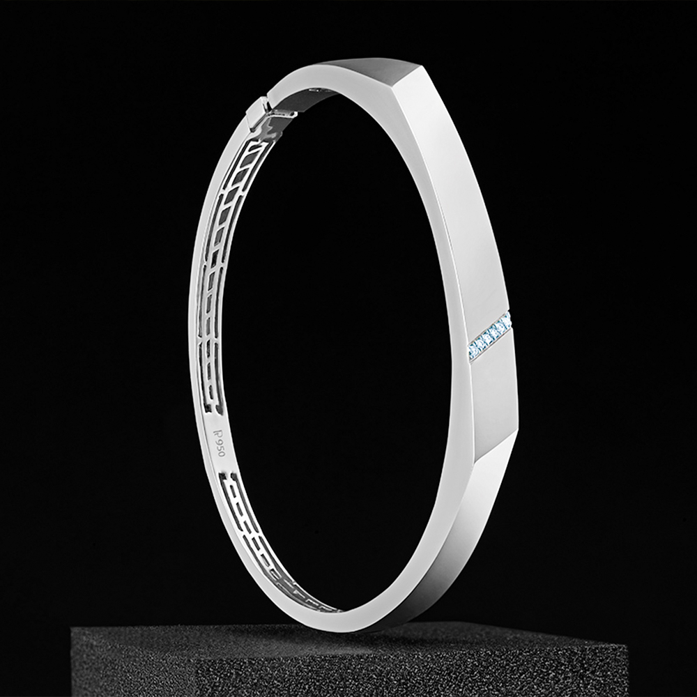 Sleek platinum bangle, minimalist style